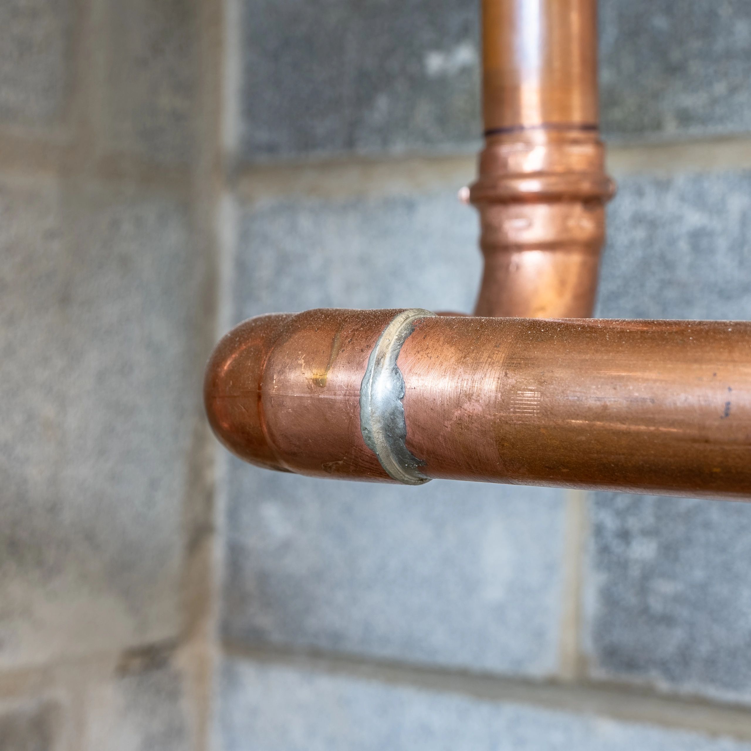 Copper pipe with clamp